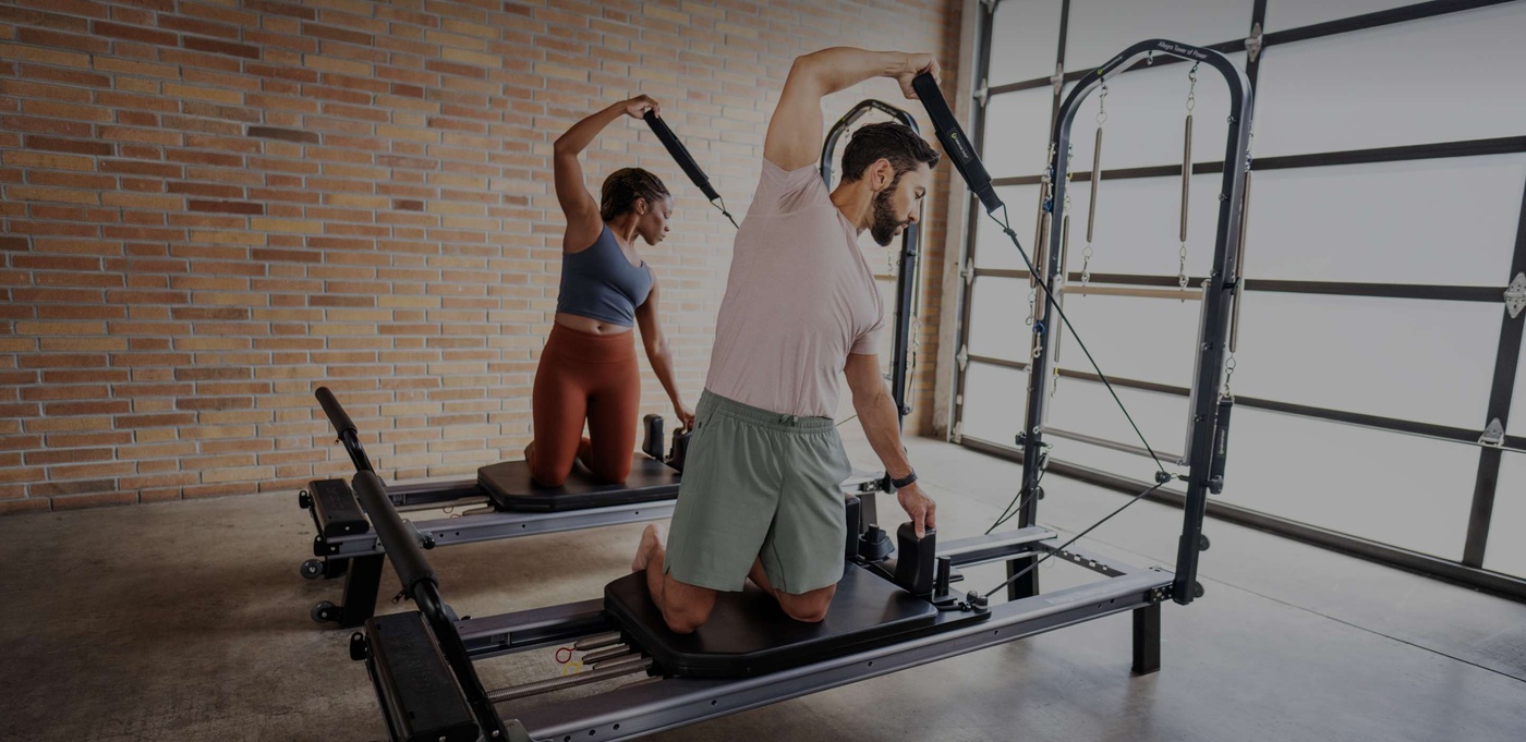 two people working on on allegro nextgen reformers