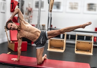 Contrology High Mat and Contrology Arm Chair in Dark Cherry